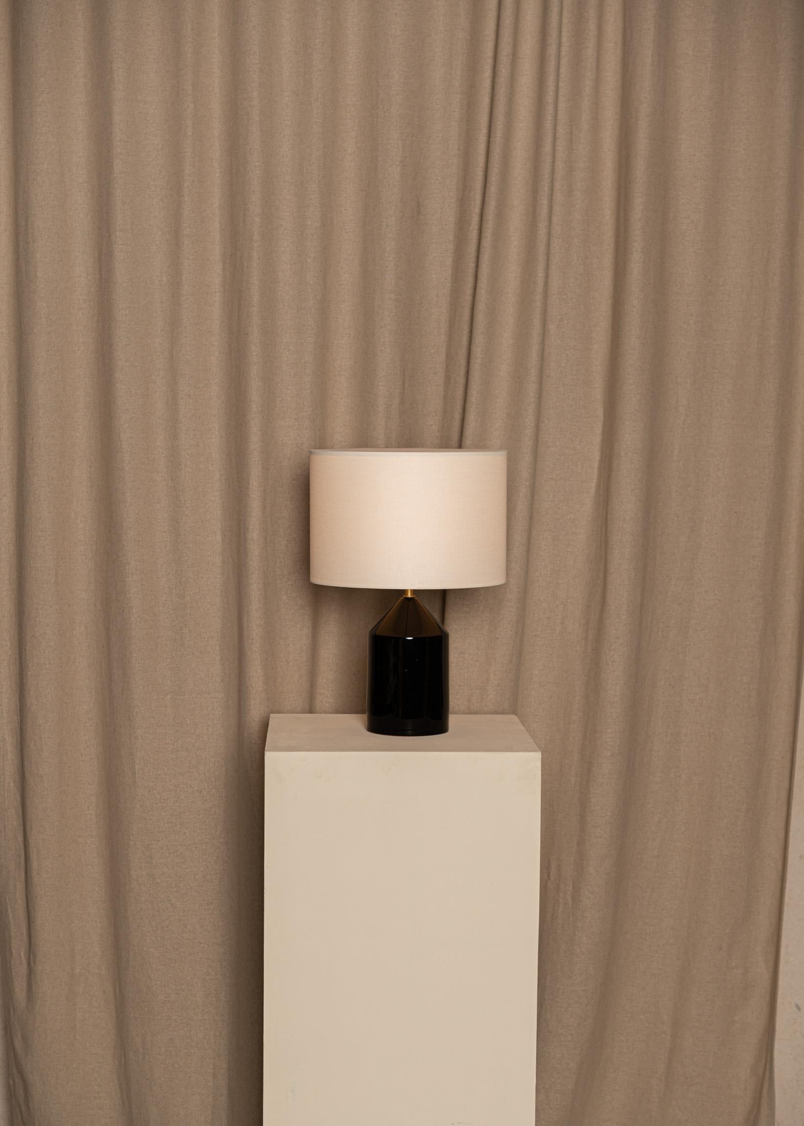 Black Ceramic Josef Table Lamp by Simone & Marcel
Dimensions: Ø 30 x H 41.5 cm.
Materials: Brass, cotton and ceramic.

Also available in different marble, wood and alabaster options and finishes. Custom options available on request. Please contact