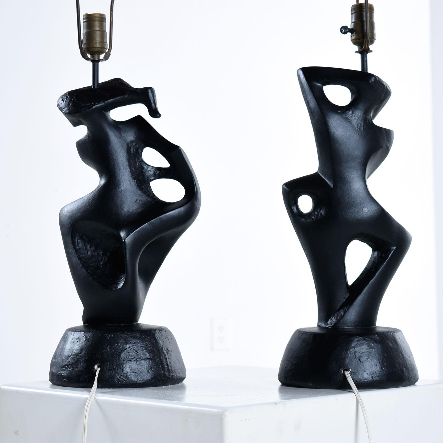 These hard to find abstract figural table lamps are made by RIMA, NY, circa 1950s.

Cubist masculine and feminine mirrored dancing forms frozen in time. Professionally repainted to match the original color and matte finish. Restored to excellent