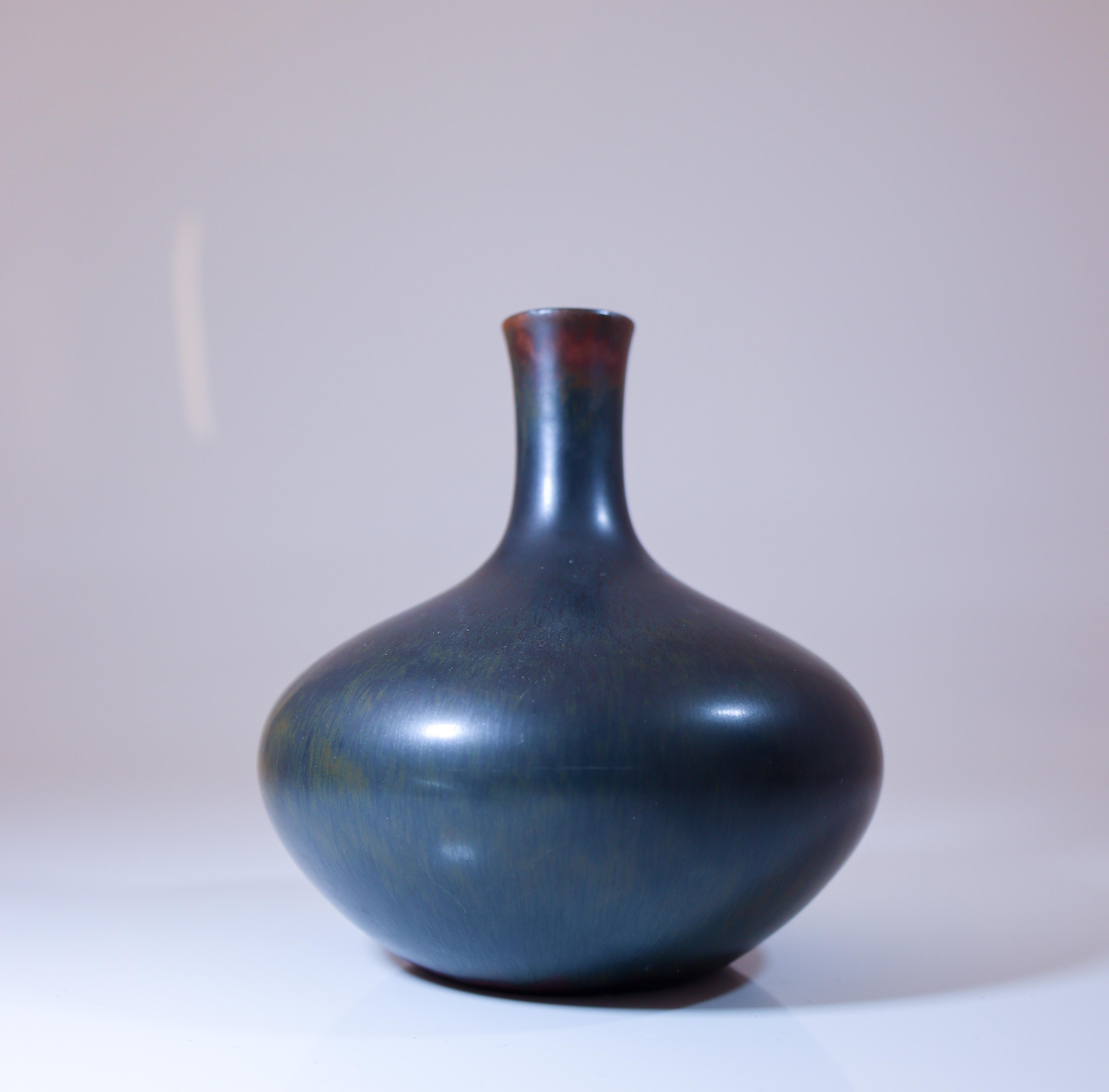 A black vase designed by Carl-Harry Stålhane at Rörstrand. The vase is 10.5 cm (4.2