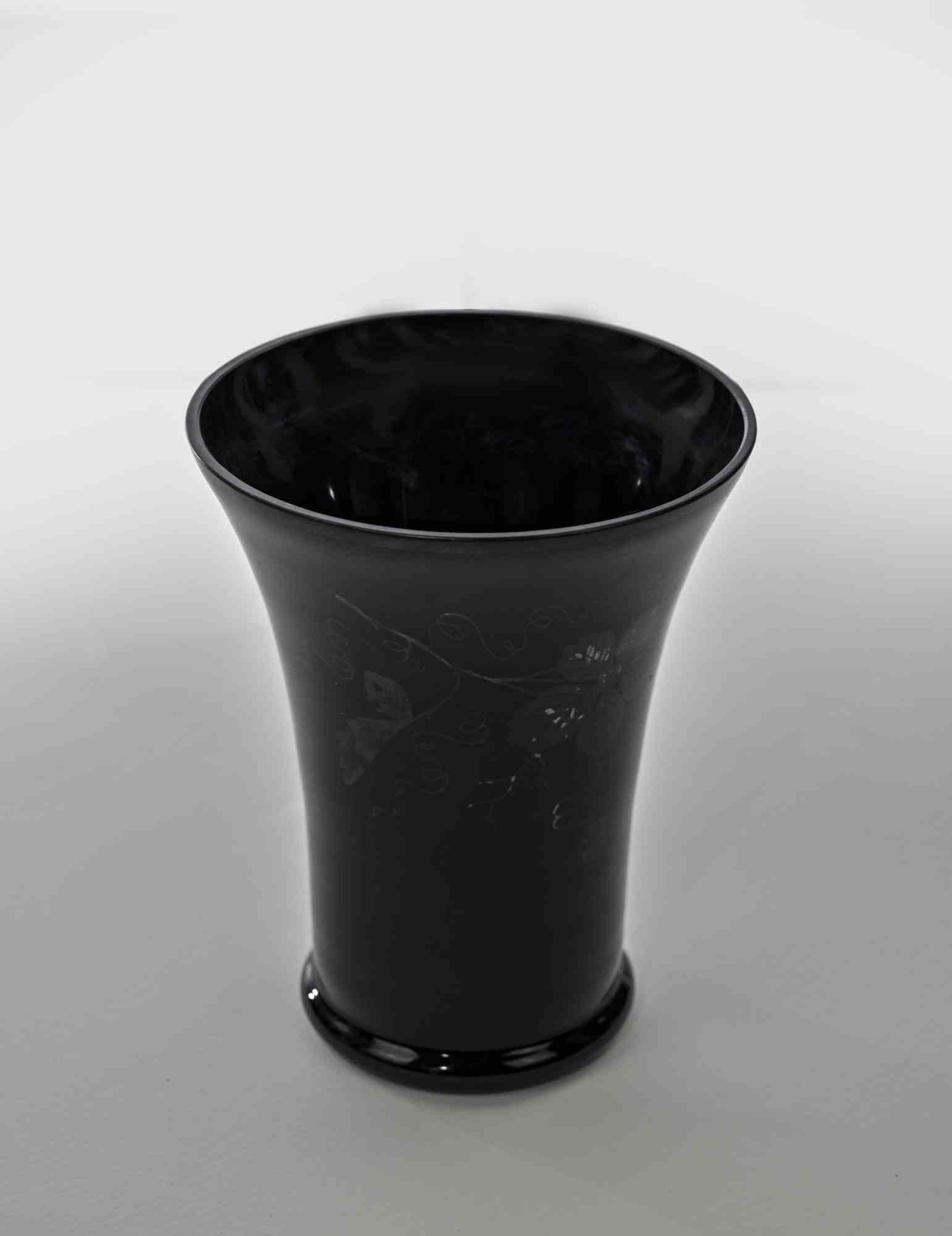 Black Ceramic Vase with Decorations, realized in Italy in 1970s.

Good condition.