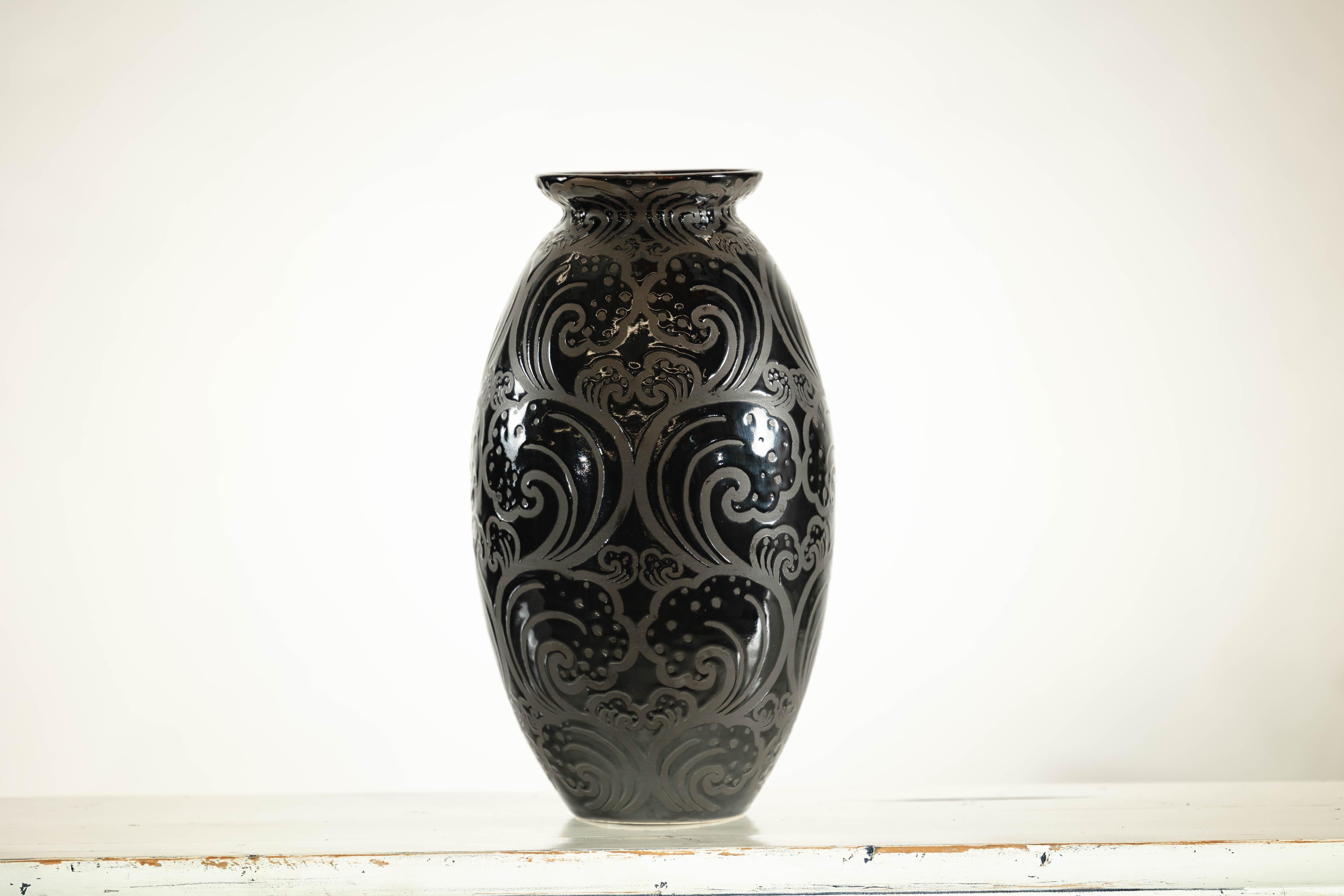 20th Century Black Ceramic Vase with Raised Wave Motif and Glossy Finish For Sale