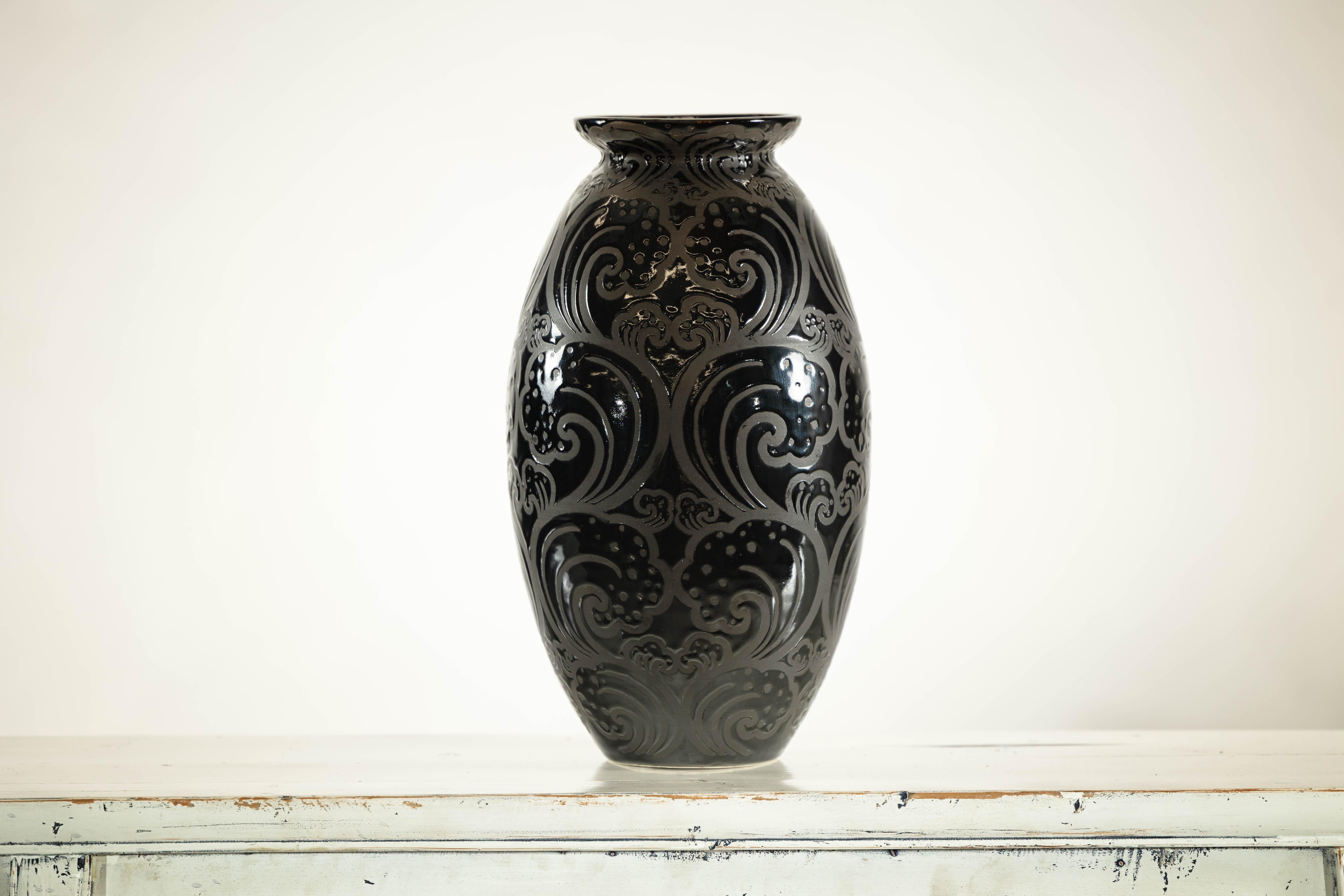 Black Ceramic Vase with Raised Wave Motif and Glossy Finish For Sale 1
