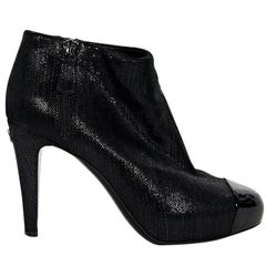 Black Chanel Embossed Cap-Toe Ankle Boots