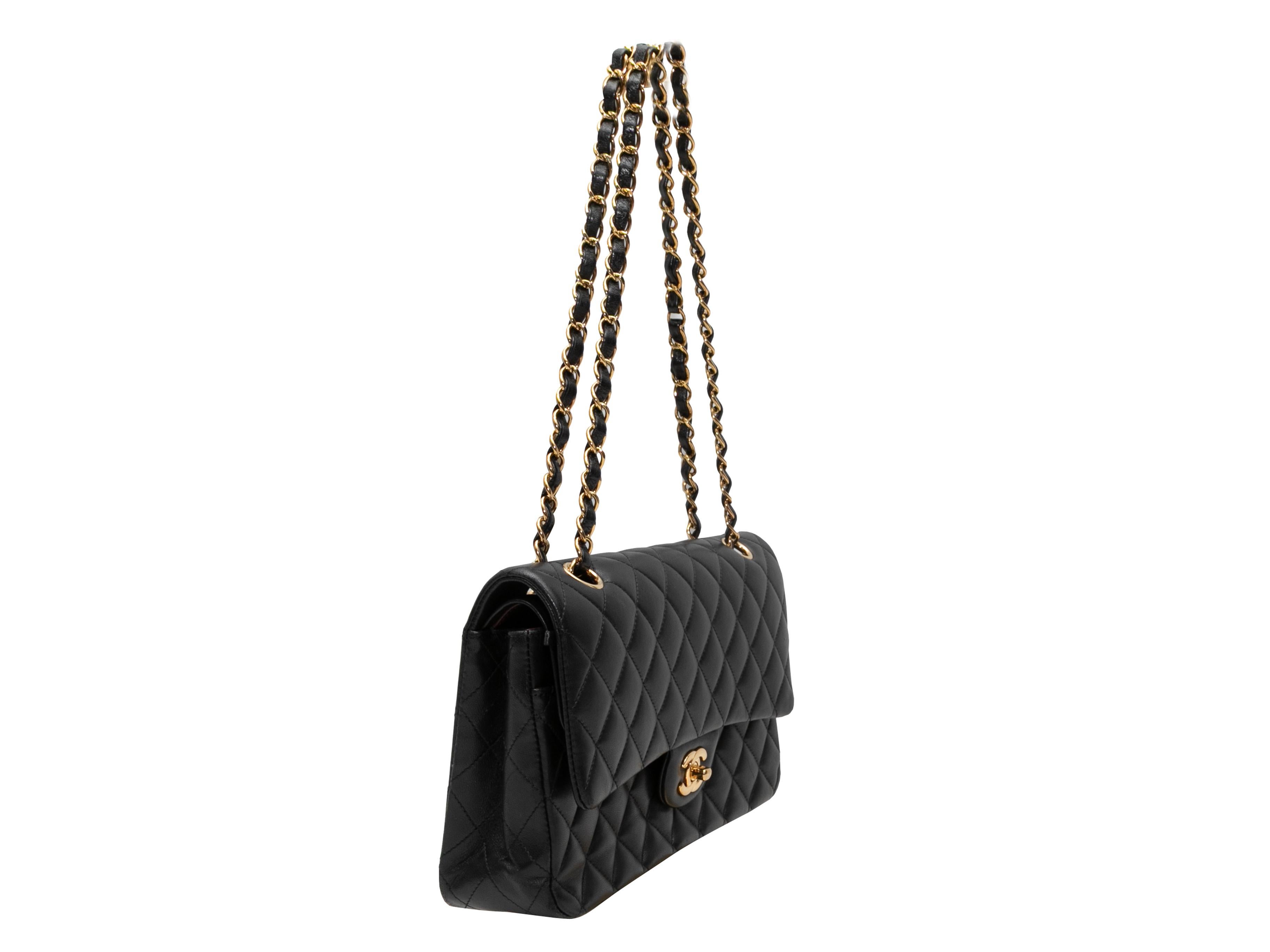 Black Chanel Lambskin Medium Classic Flap Bag. The Medium Classic Flap Bag features a quilted lambskin body, gold-tone hardware, dual chain-link and leather straps, and a front CC turn-lock flap closure. 10