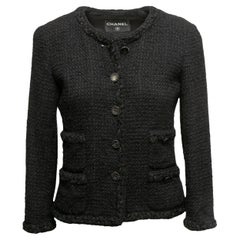 Giacca Chanel nera in lana e tweed senza colletto taglia US XS/S