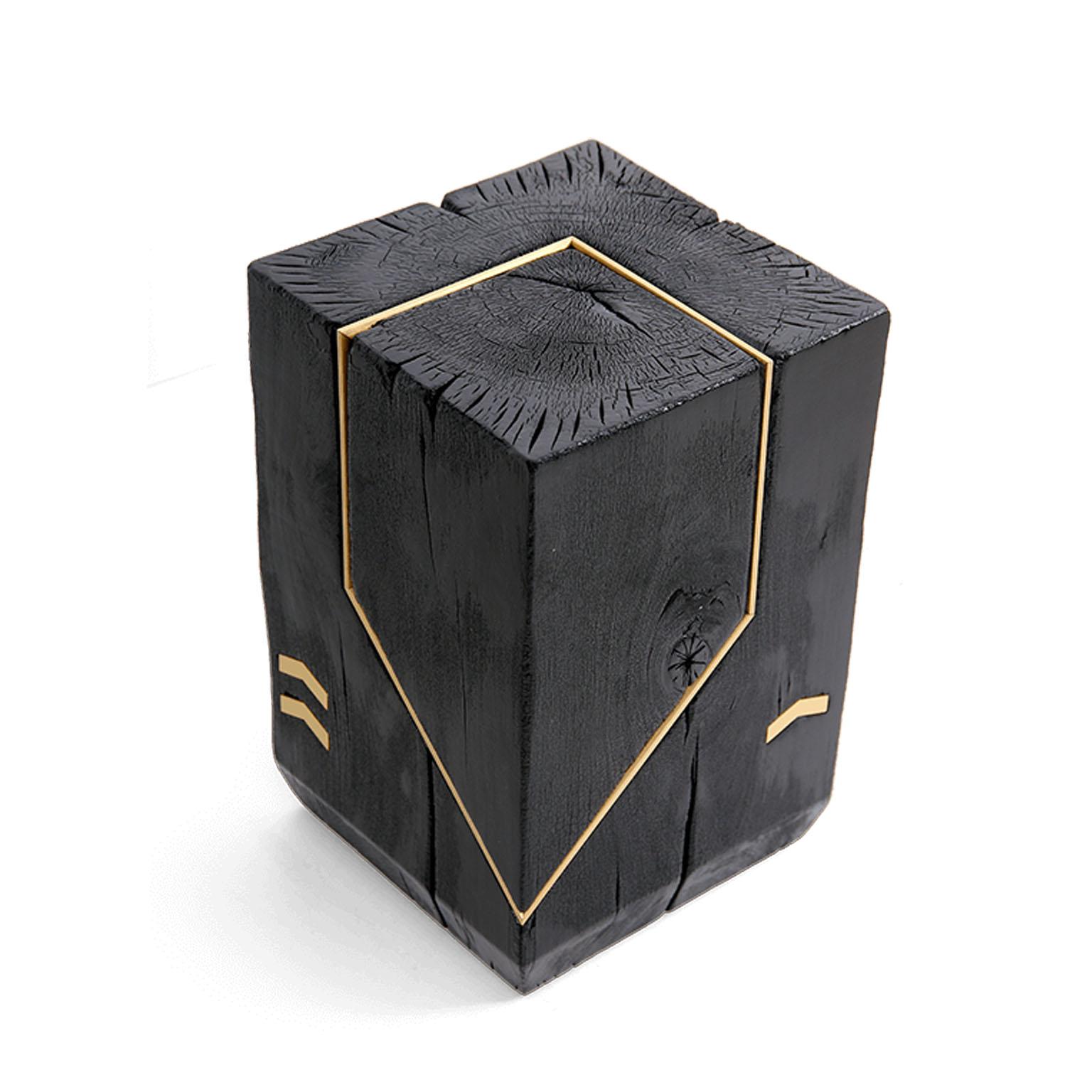 The Kanagawa Charred Timber side table brings nature into your home. It is a simple cube side table with a strong impact. Made from solid hardwood, and retaining the natural live edge of the tree, each piece of wood is hand-picked and absolutely