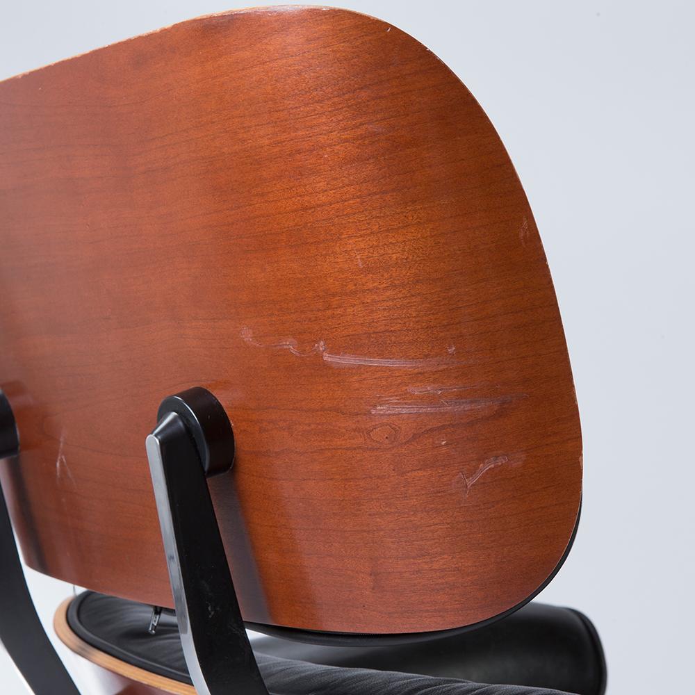 20th Century Black and Cherry Herman Miller Eames Lounge Chair and Ottoman