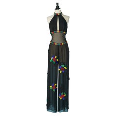 Combinaison de soirée en mousseline de soie noire avec broderies et perles.