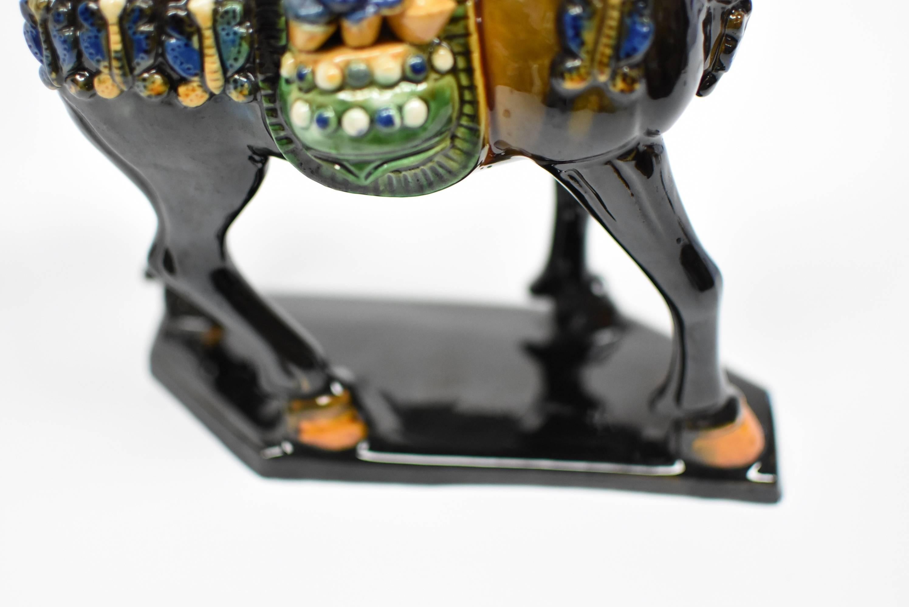 Glazed Black Chinese Pottery Horse, with Money Bag