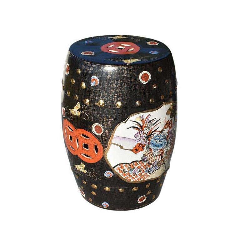 Any Grand Millennials dream, this chinoiserie black garden stool will be the perfect addition to any living room or patio. The body is painted in black with gold accents with a lovely texture. The sides feature a botanic design on a white