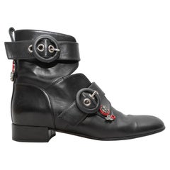 Christian Dior - Bottines à boucle découpée noires, taille 38,5