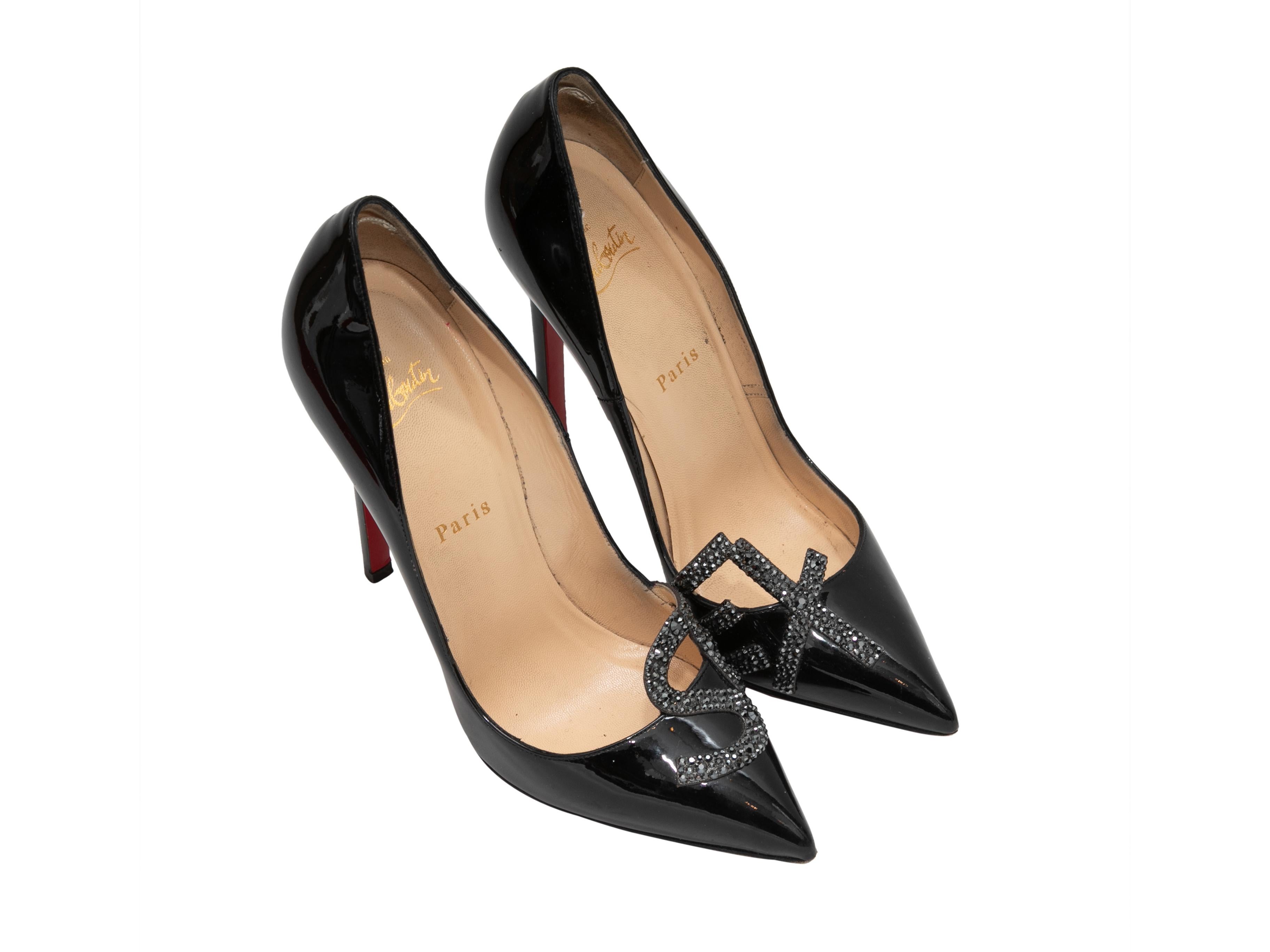 Black pointed-toe patent leather Sex pumps by Christian Louboutin. 4.5
