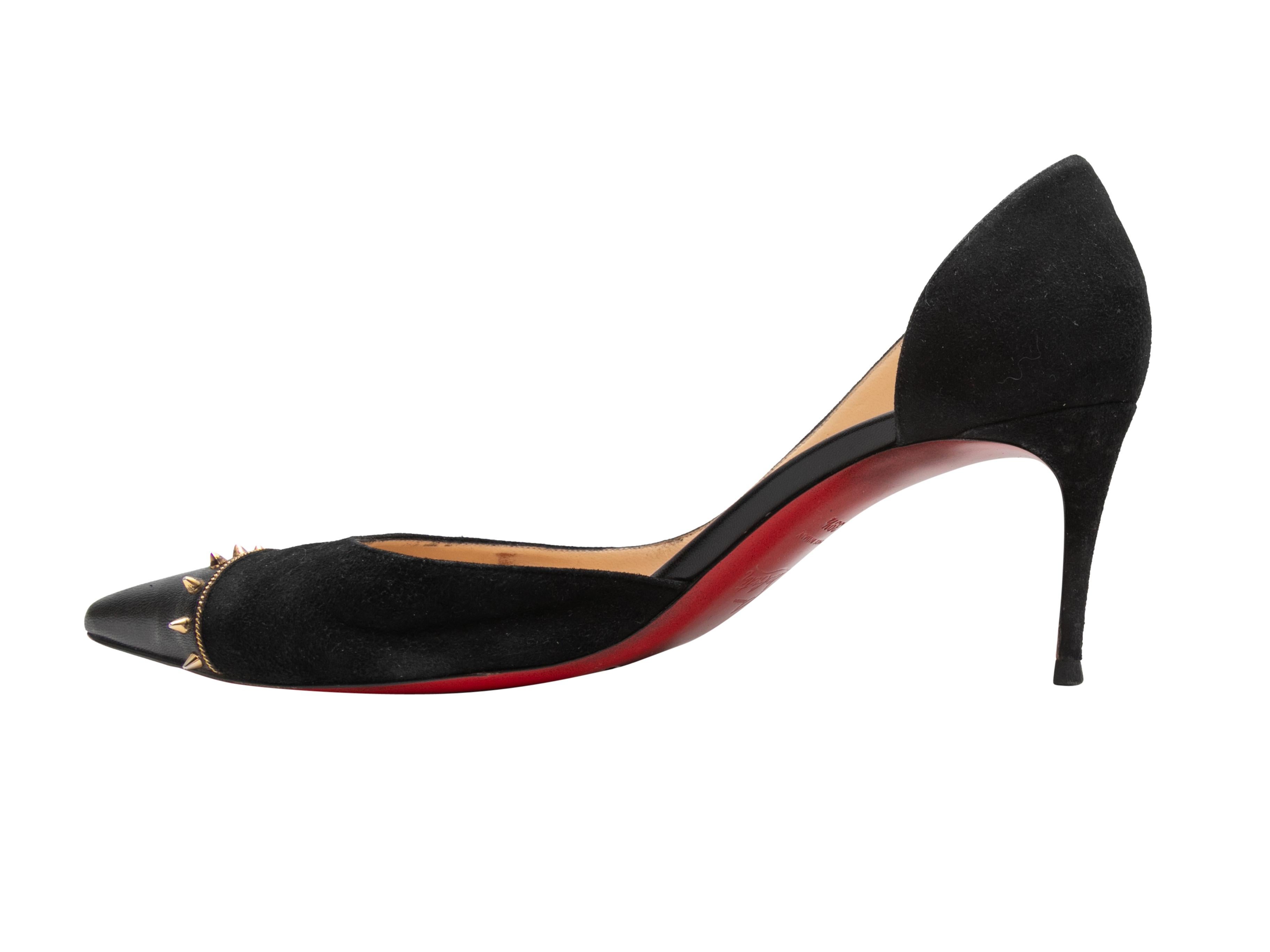Black suede and leather pointed-toe pumps by Christian Louboutin. Gold-tone conical studs at toes. 2.75