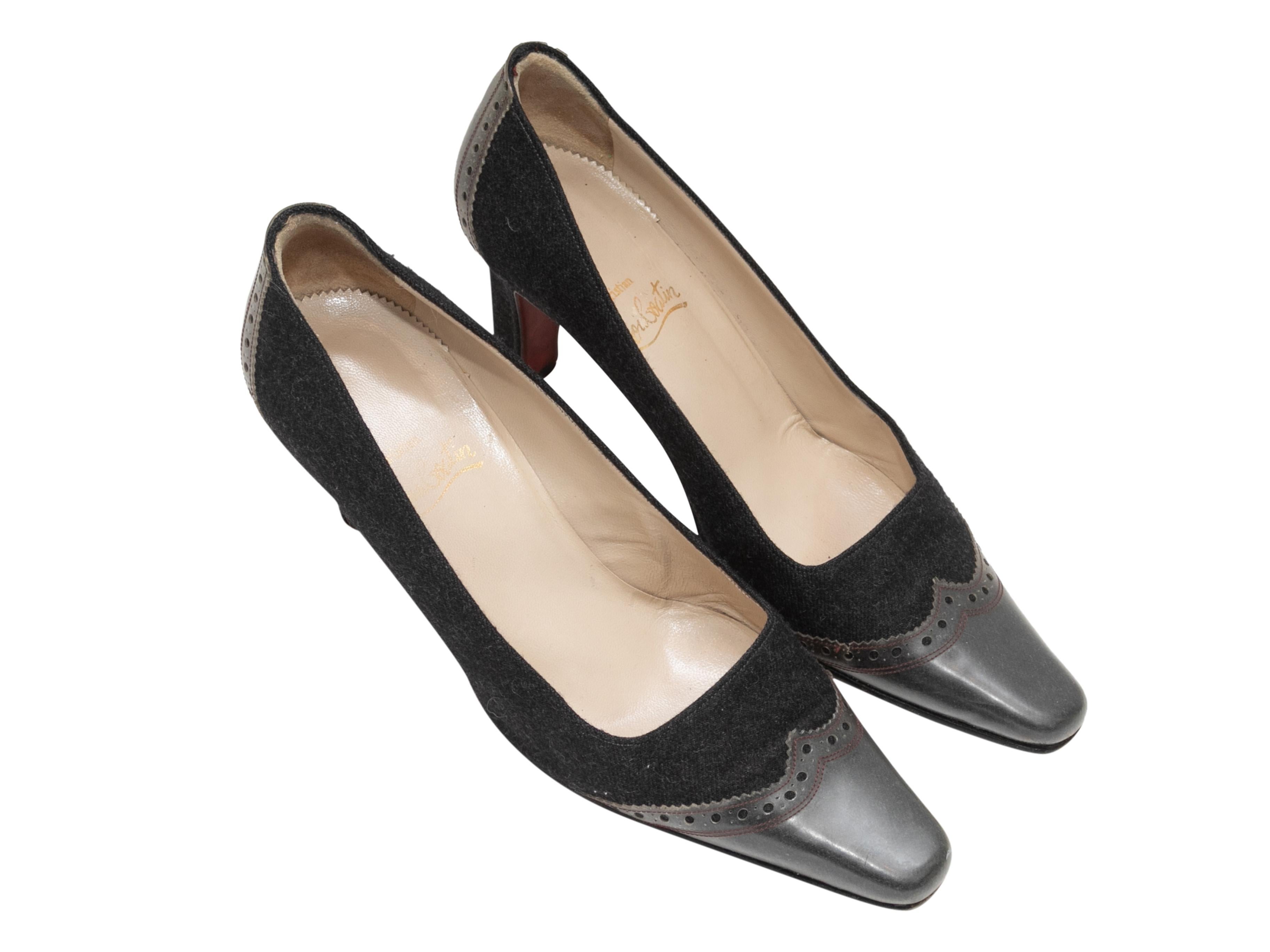 Black wool and leather pointed-toe brogue pumps by Christian Louboutin. 2.5