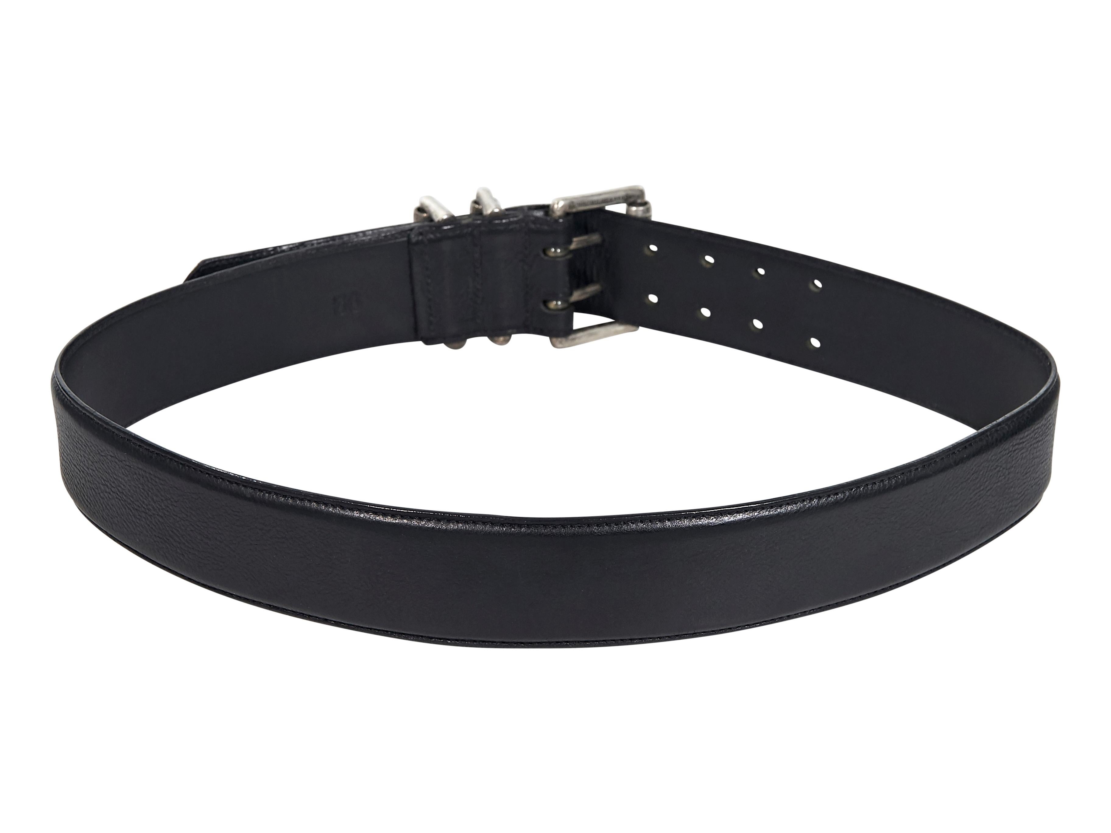 Product details:  Black leather belt by Chrome Hearts.  Adjustable buckle closure.  Sterling silver hardware.  2.25