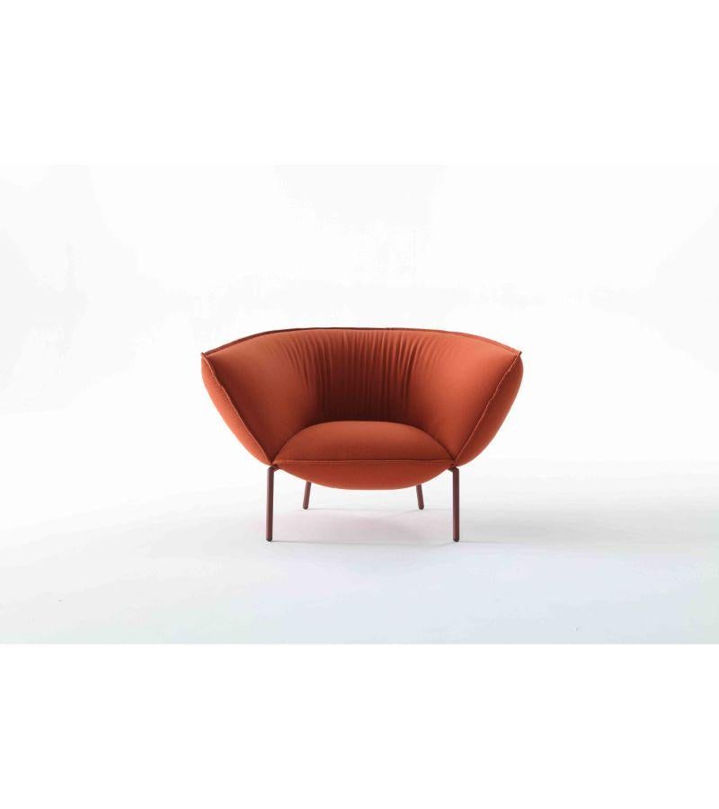 Black chromed you armchair by Luca Nichetto 
Materials: Lacquered metal structure. Fabric upholstery. Structure colors: Black chrome, red or beige lacquered. Seat and back coated with polyurethane foam expanded with a density of 50 kg and 35 kg