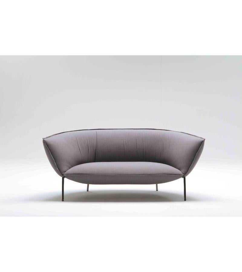 Black chromed YOU sofa by Luca Nichetto 
Materials: Black chromed structure. Fabric upholstery. Structure colors: Black chrome, red or beige lacquered. Seat and back coated with polyurethane foam expanded with a density of 50 kg and 35 kg square