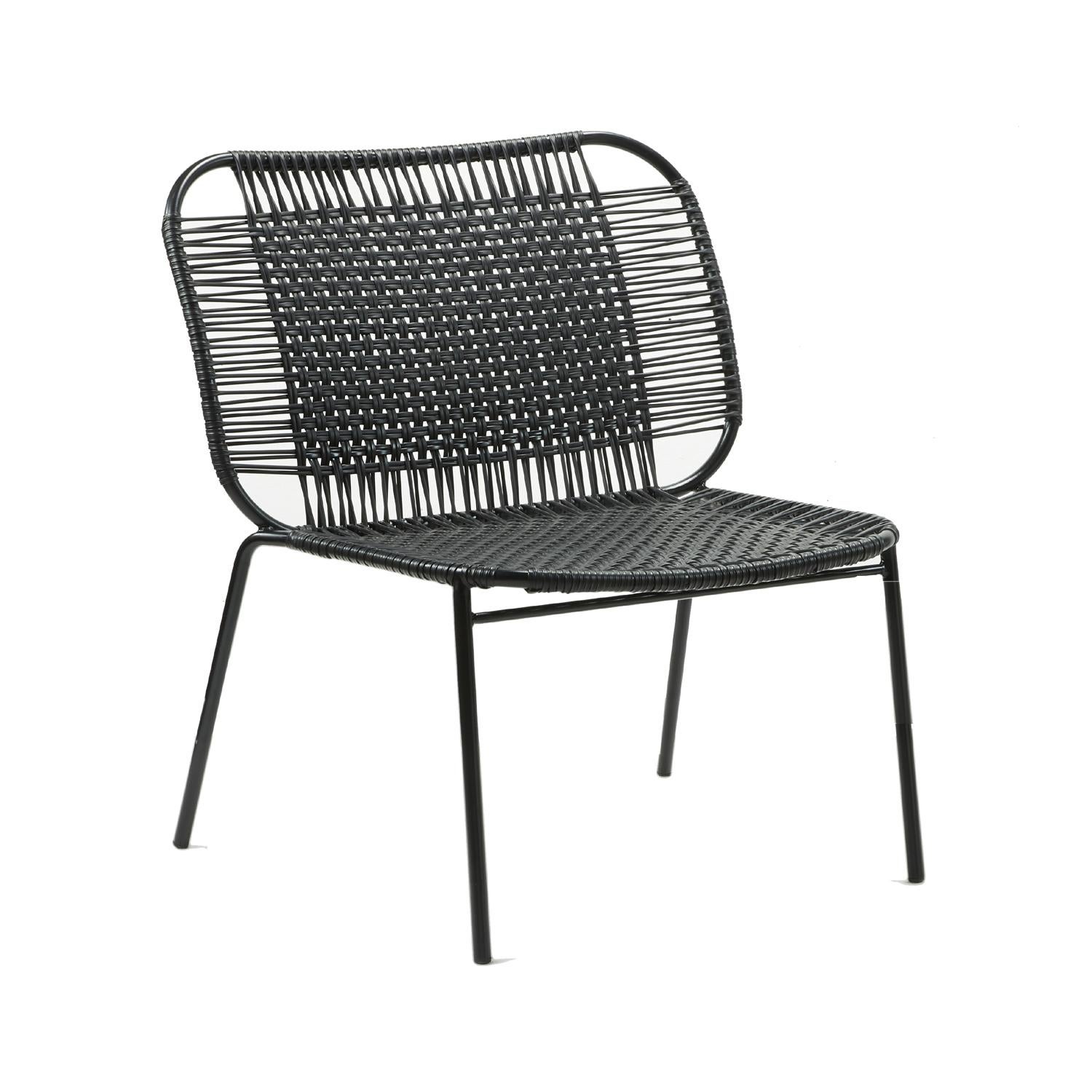 Black Cielo lounge low chair by Sebastian Herkner
Materials: Galvanized and powder-coated tubular steel. PVC strings are made from recycled plastic.
Technique: Made from recycled plastic and weaved by local craftspeople in Cartagena, Colombia.