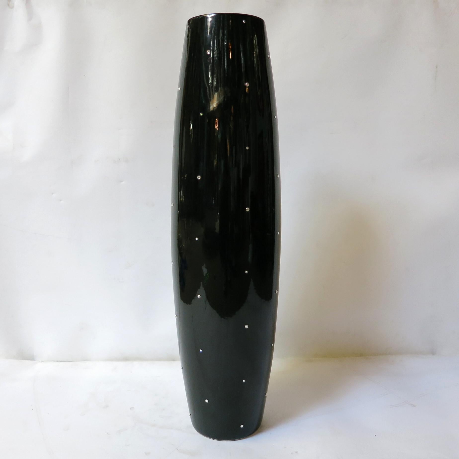One of a kind black ceramic cigar shaped vase with Swarovski crystals / Designed by Fabio Bergomi / Made in Italy
Height: 36 inches / Diameter: 9 inches
1 in stock in Palm Springs  currently ON FINAL CLEARANCE SALE for $799!!!
This piece makes for a