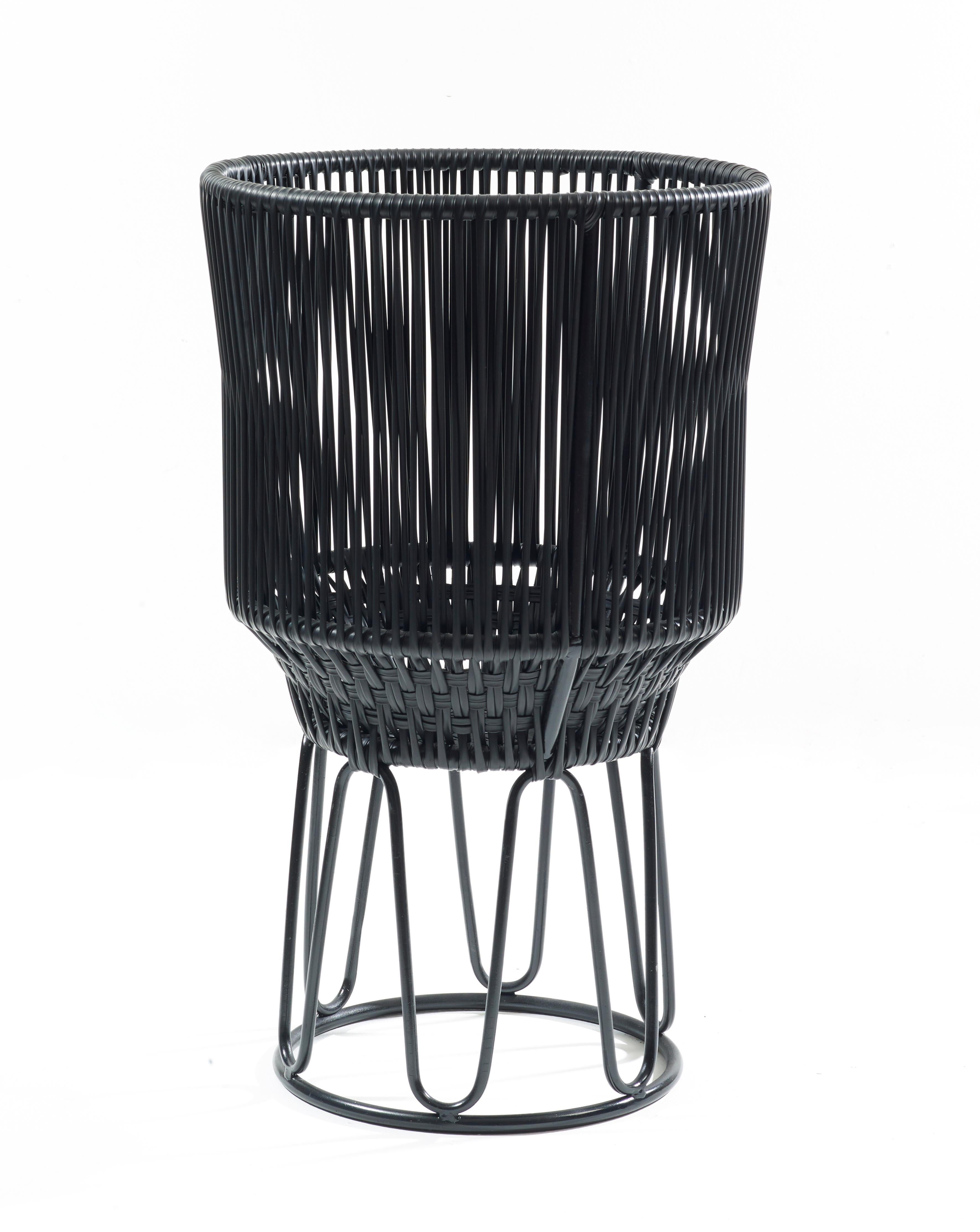 Black circo flower pot 2 by Sebastian Herkner
Materials: Galvanized and powder-coated tubular steel. PVC strings.
Technique: Made from recycled plastic. Weaved by local craftspeople in Colombia. 
Dimensions: 
Top diameter 40 x height 68 cm