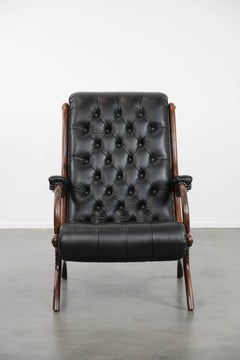 Black classic and comfortable cowhide leather chesterfield armchair