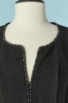 Black coat with zip closure on the middle front with tweed piping CHANEL SS 2006