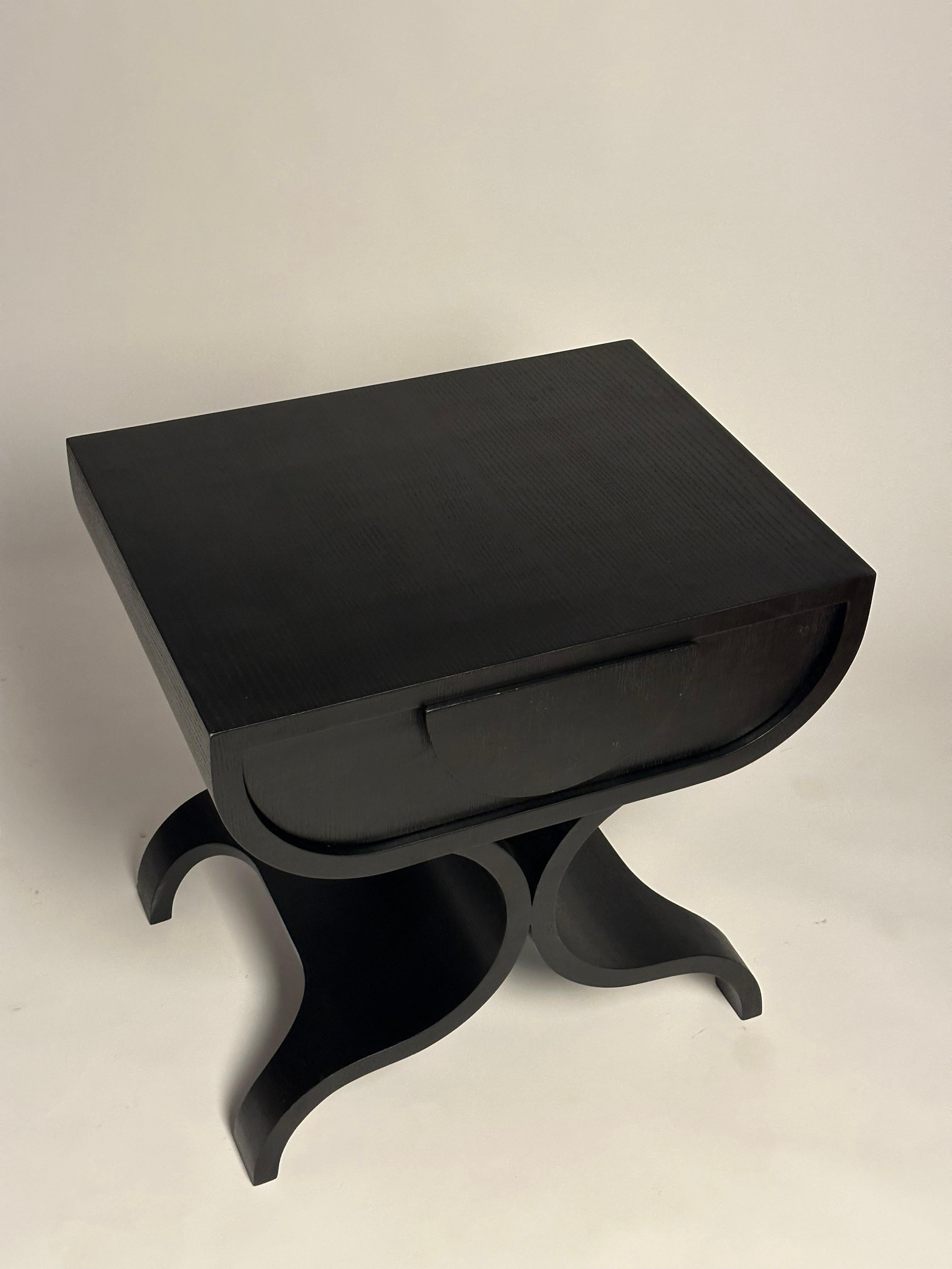 The “BLACK COBRA” is the sister of the “COBRA” nightstand. This is a new line of furniture that is inspired by the undulating movement of a cobra, a snake that was worshipped in ancient Egypt as a symbol of royalty. Designed by Hassan Abouseda for