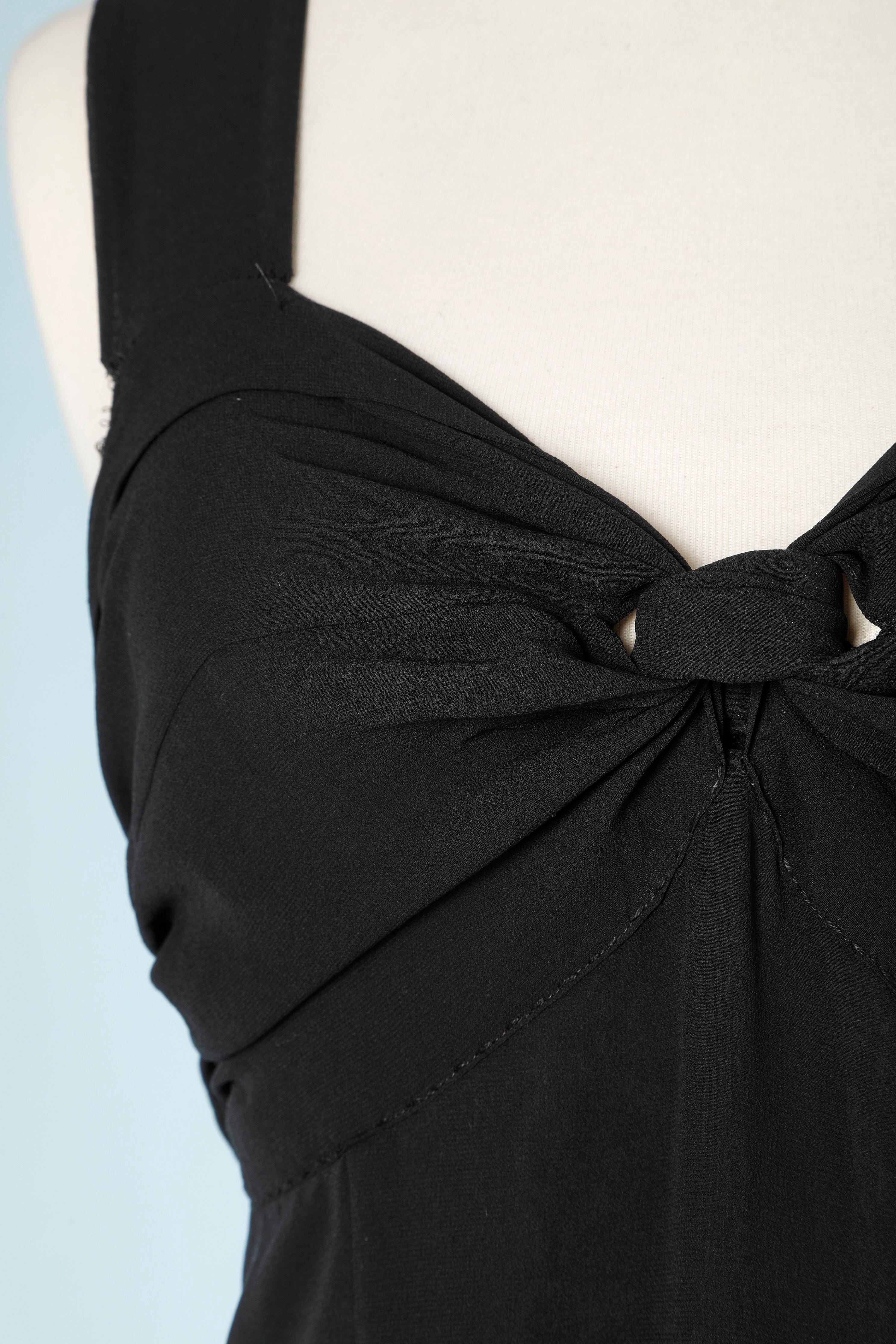 Black chiffon dress with a draped knot on the belly