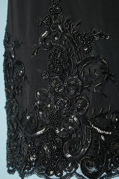 Schwarzes Cocktailkleid aus schwarzer Spitze mit schwarzer Perlenarbeit am unteren Rand von Chanel