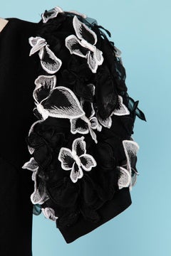 Black cocktail dress with black&white butterfly appliqué sleeves  Louis Féraud