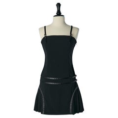 Black cocktail dress with pleated skirt Versace Jeans Couture 