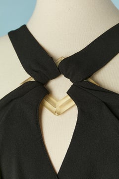Black cocktail dress with resin buckle on the top front and wrap Thierry Mugler