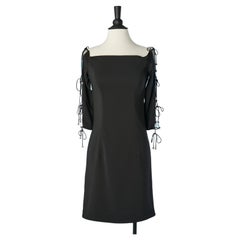 Black cocktail dress with see-through sleeves and Rhinestone pompoms JIKI 