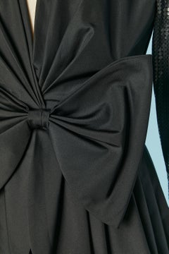 Black cocktail dress with transparent sequin and bow CD de Christian Dior