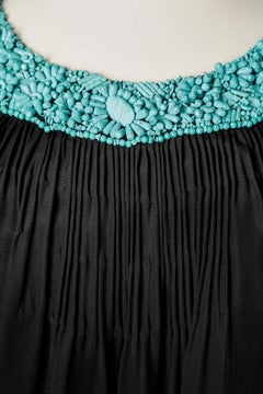 Black cocktail dress with turquoise beaded neckline Moschino Cheap And Chic