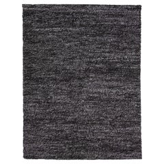 Tappeto Modern Color nero in lana testurizzata infeltrita di Apadana