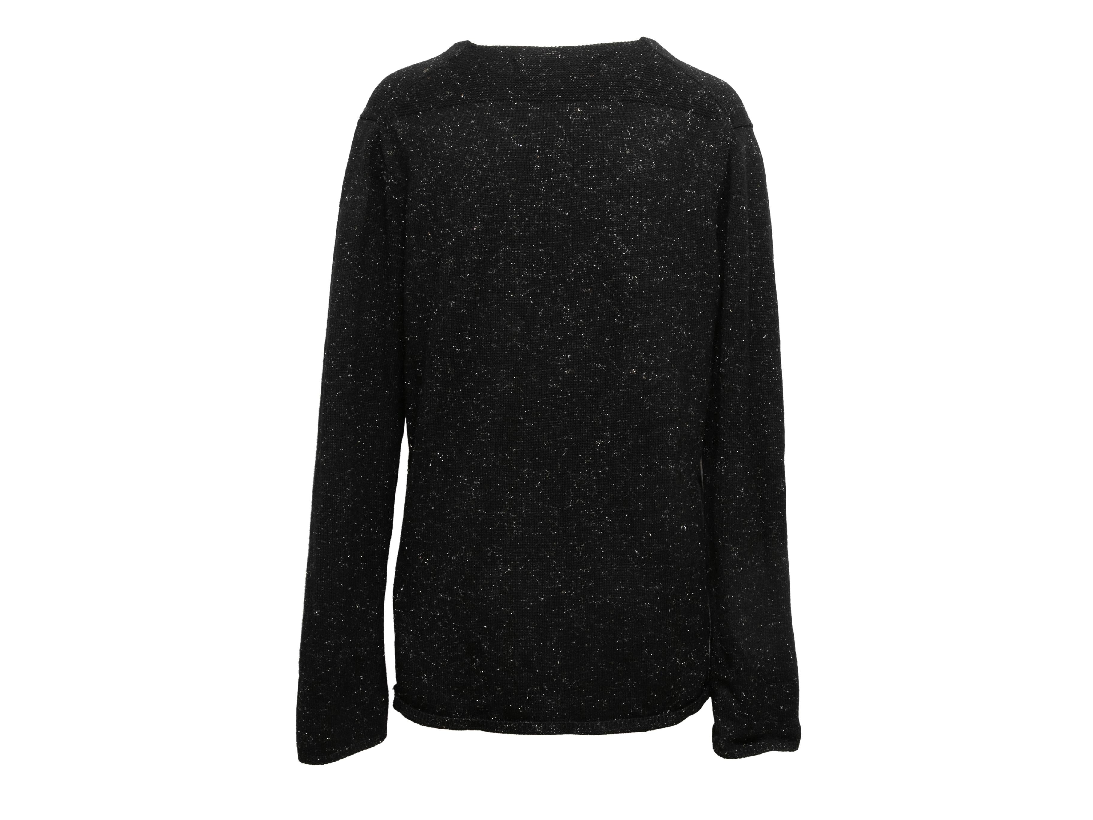 Black wool-blend metallic knit sweater by Comme Des Garcons Homme Plus. From the Fall/Winter 2014 Collection. Crew neck. 42