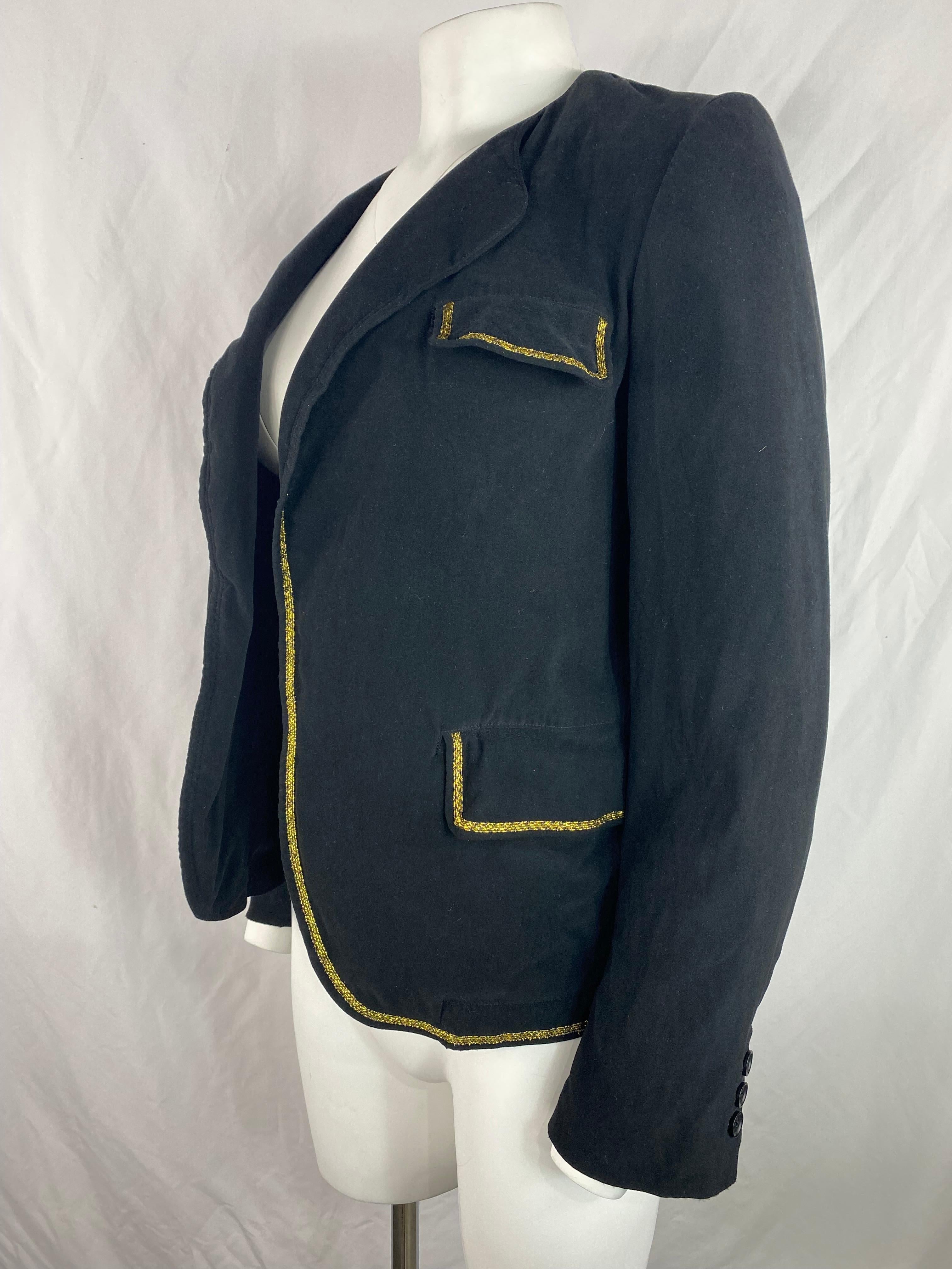 Product details:

The jacket features black velvet with gold trimming detail.
