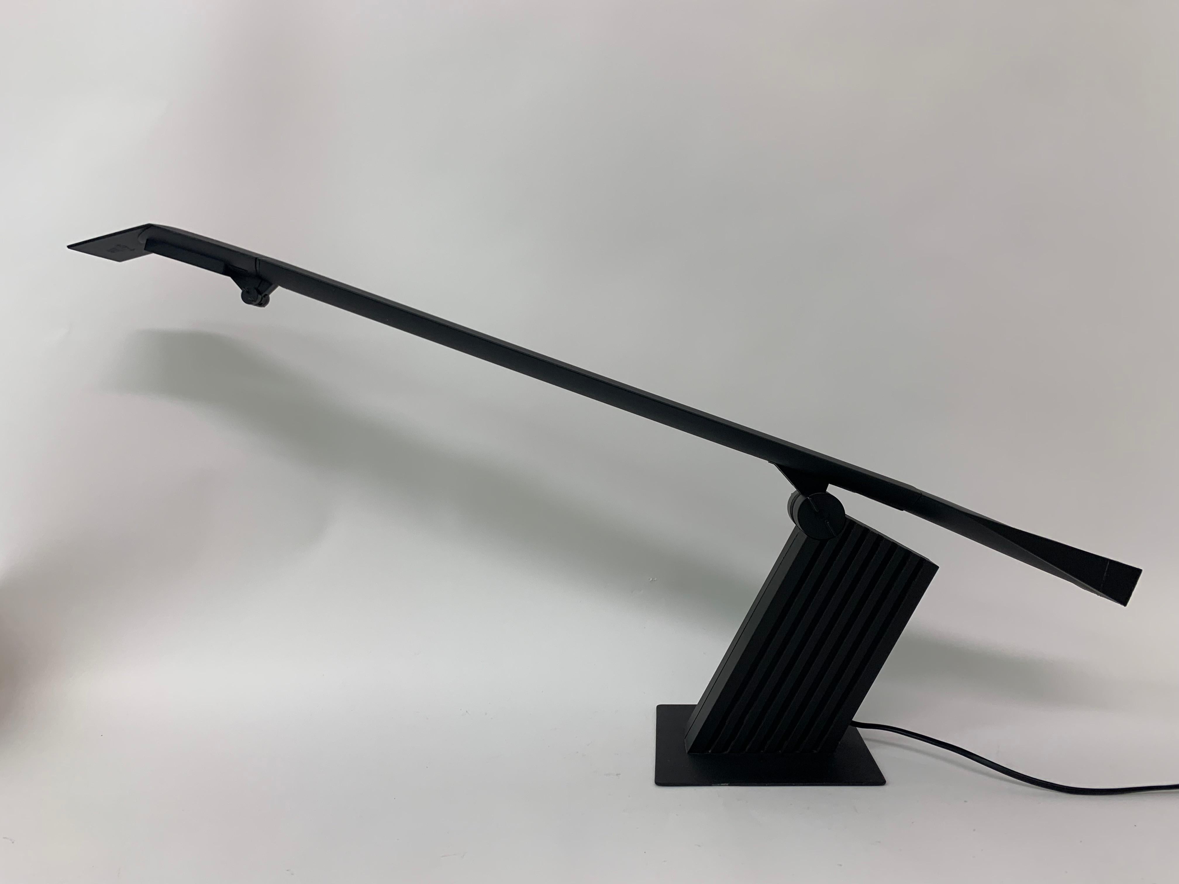A nice large black Condor desk lamp, designd by Hans von Klier and produced by Bilumen in 1988.