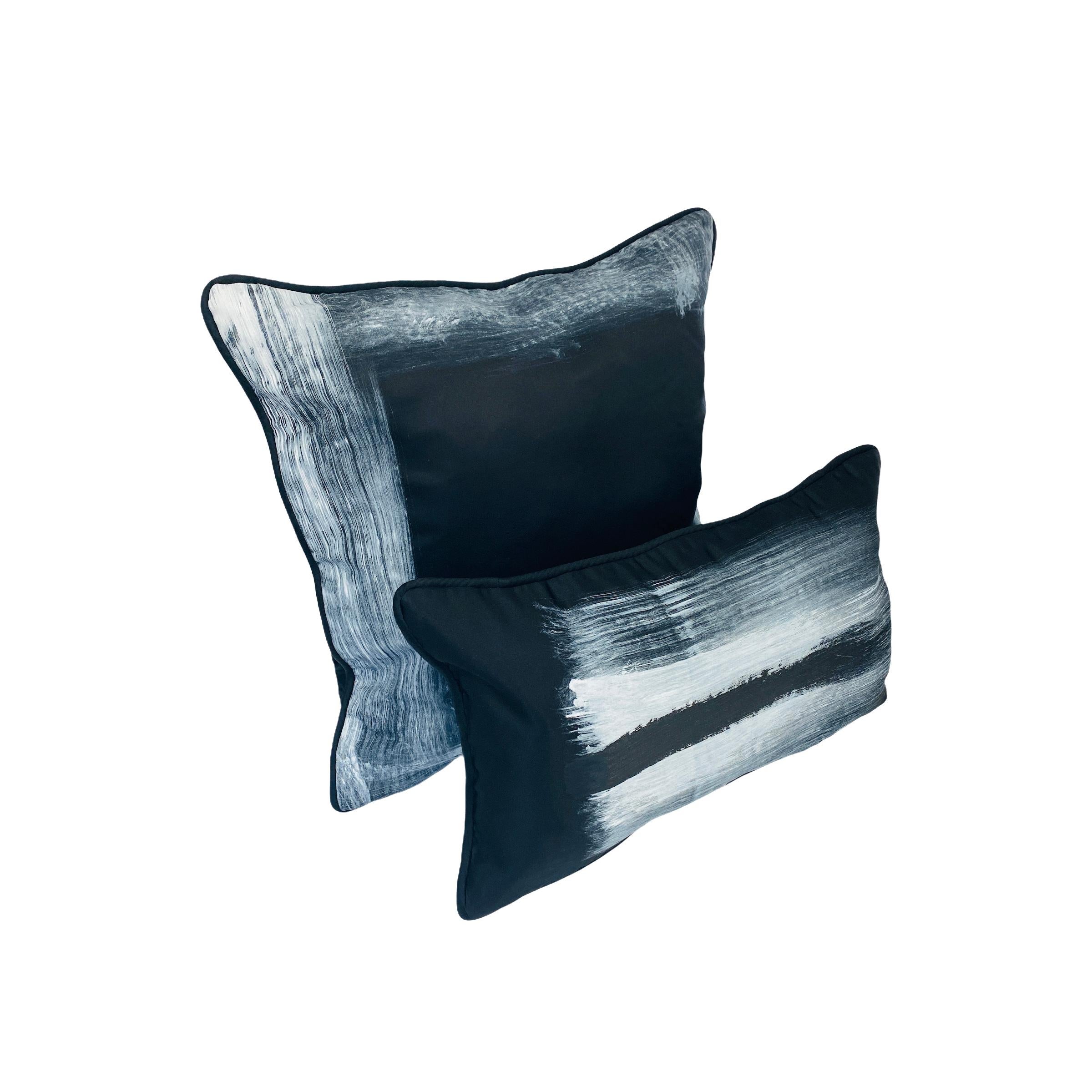 Authentic Italian silk duchesse satin pillows in midnight black. Hand-painted white artwork inspired by the minimalist art movement of the 1960s and 1970s. These pillows were dreamt up by our in-house design studio in Manhattan. Large pillow: 20 x