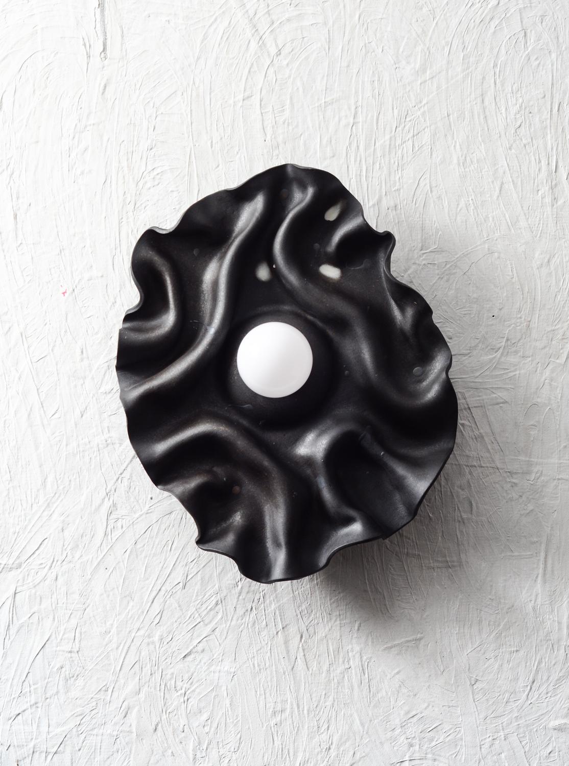 Arts and Crafts Black contemporary folded ceramic wall sconce For Sale