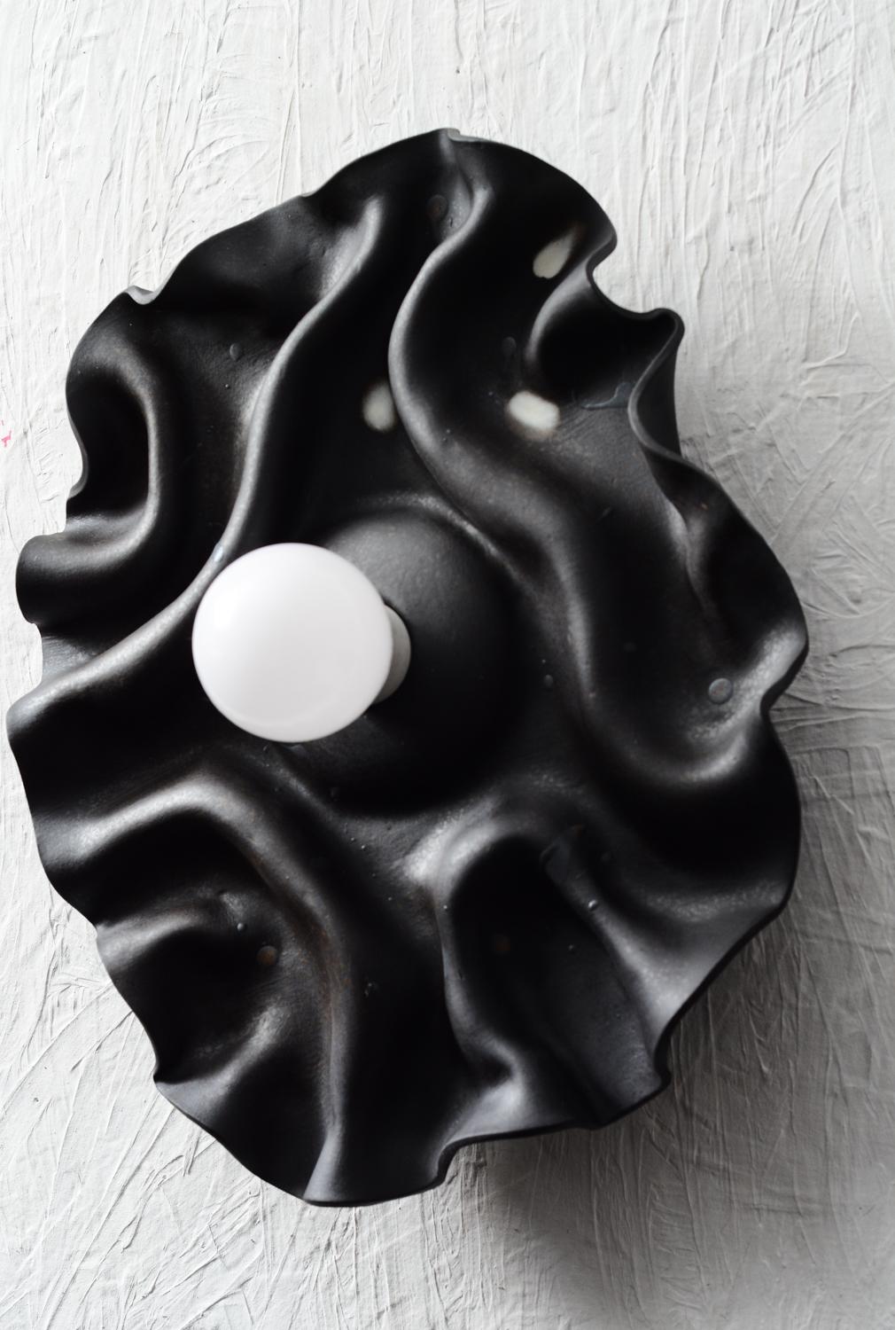 Black contemporary folded ceramic wall sconce In New Condition For Sale In Attleboro, MA