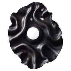 Black contemporary folded ceramic wall sconce