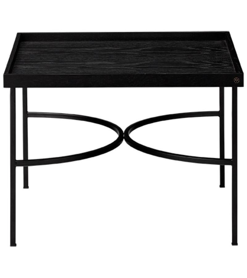 Black contemporary tray table 
Dimensions: D 52.5 x W 52.5 x H 38 cm 
Materials: Iron with Powder Coating or Iron with Brass Plating.
Available in Black, Oak, Walnut, and Black or Gold Powder-Coated Base.


Impeccable quality and sophisticated