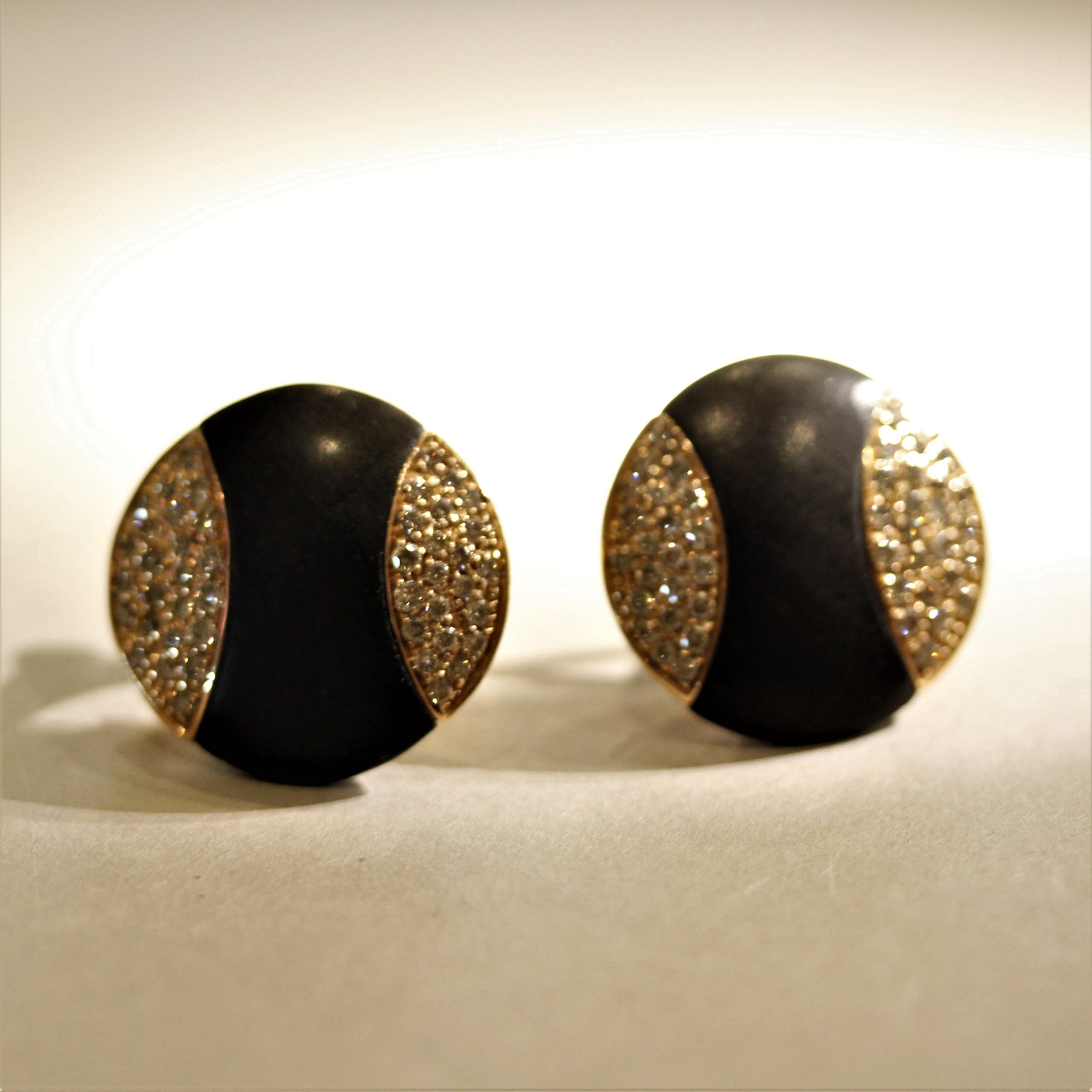 A unique and stylish pair of earrings! They feature 15 carats of natural black coral which are sandwiches between diamonds weighing 1.22 carats and cut as round brilliants. Set in 18k rose gold, these fun stylish earrings will complement any