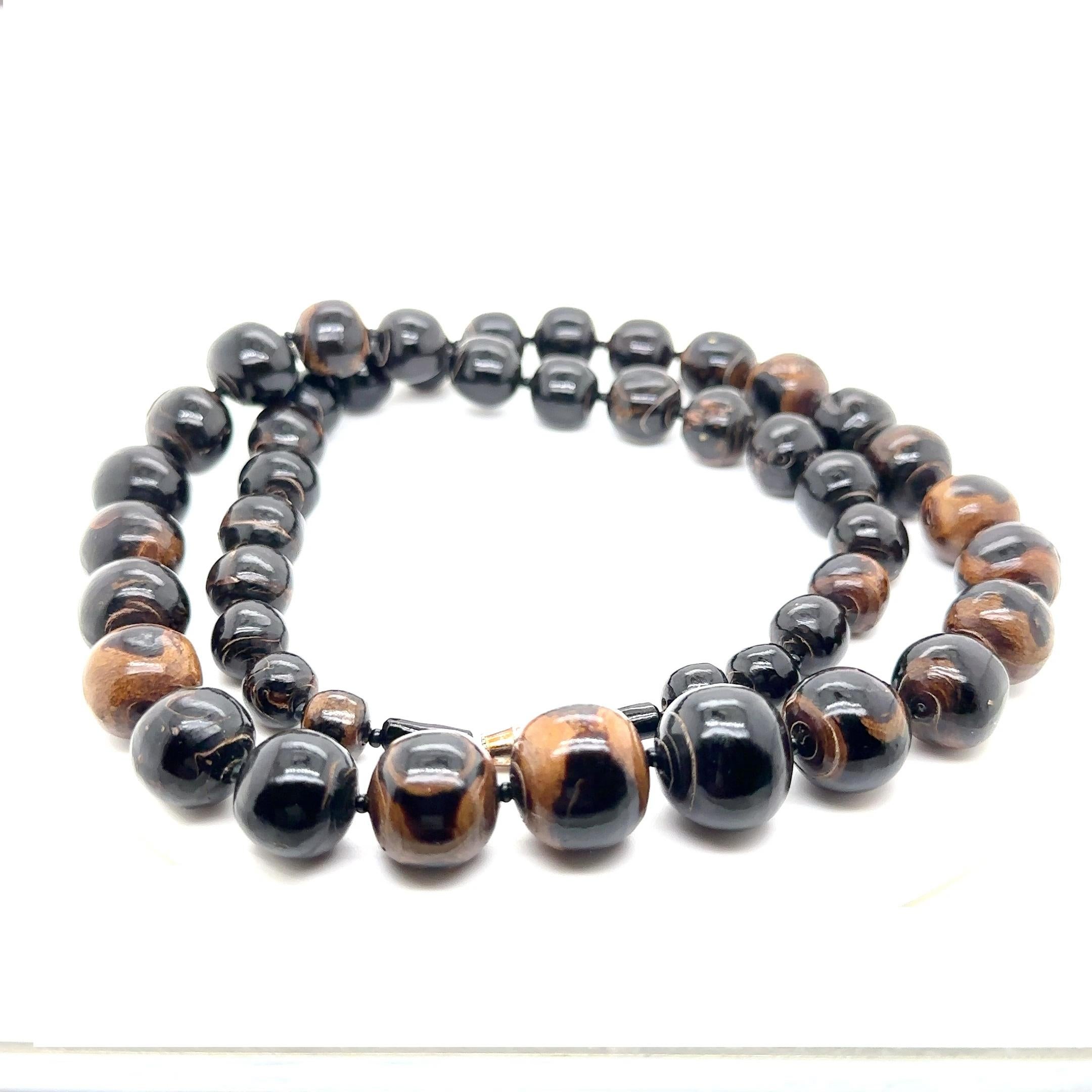 Contemporary Black Coral necklace - 26.5 inches Natural Black Coral Graduated Bead Necklace For Sale