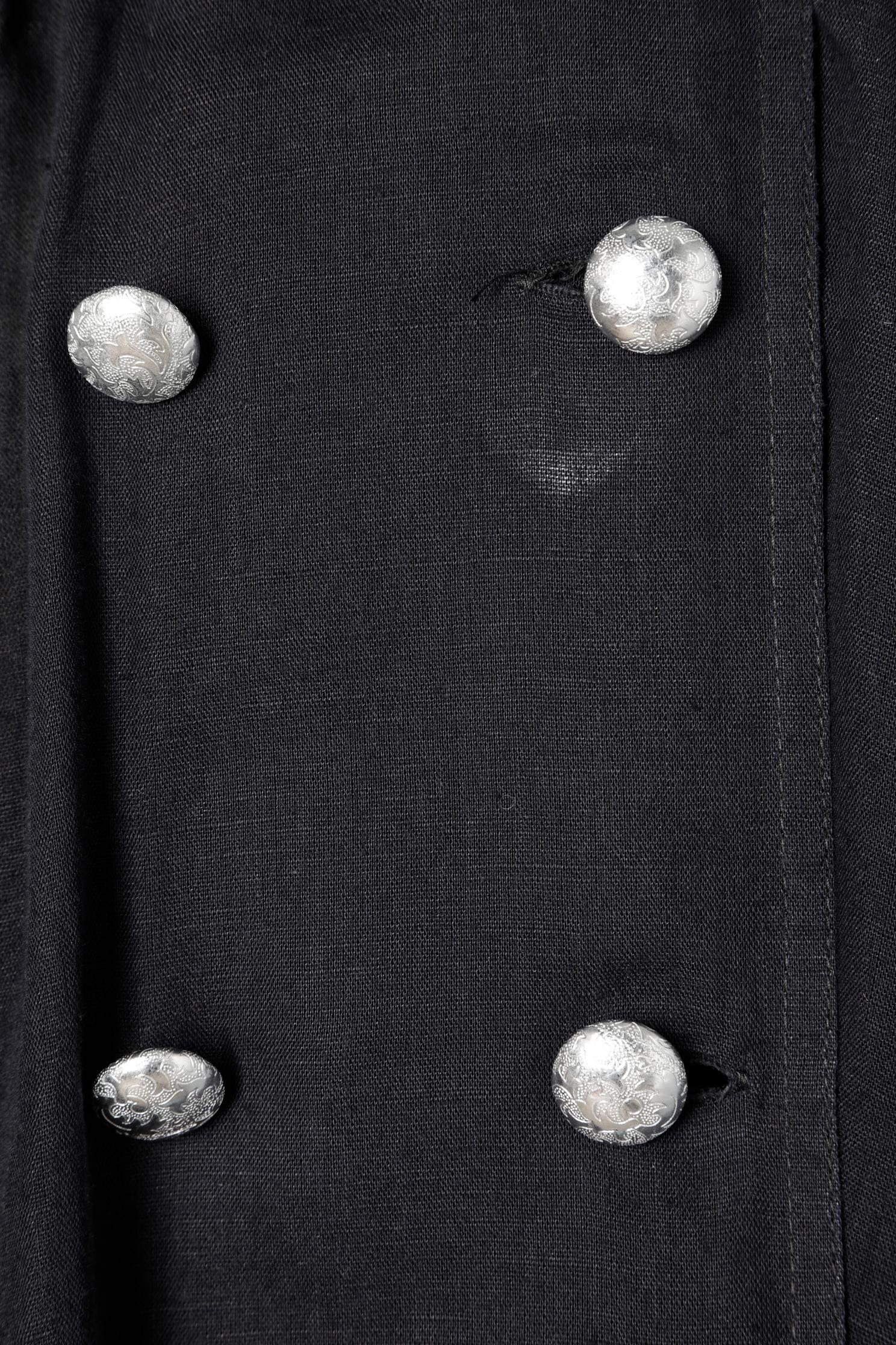 Black cotton and linen double breasted dress-coat. Fabric composition: 49% linen, 51% cotton. 
Silver metal buttons on the middle front and cuffs. Belt. Pocket on both side. 
SIZE 40(Fr) 8 (Us) M 