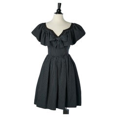 Black cotton dress with blue stripes, ruffles and bow YSL Rive Gauche