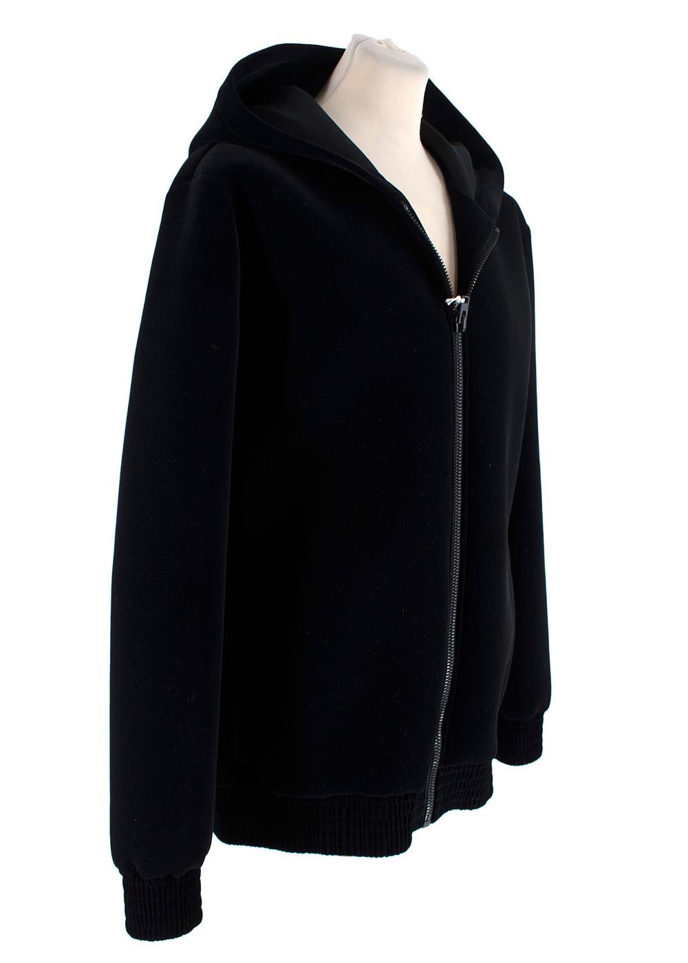 Givenchy Black Cotton-Jersey Cobra Hoodie

- Heavyweight black cotton jersey with large cobra printed motif on the back
- Zip through with silver-tone metal zip 
- Pockets on each side with button closure 
- Ribbed cuffs and hemline

Materials 
94%