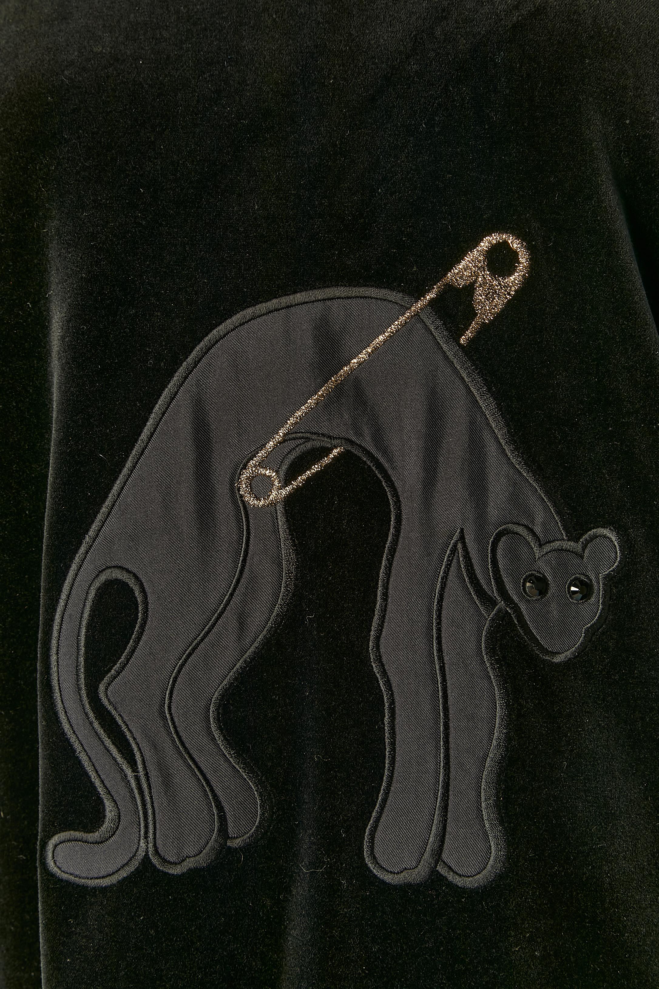 Black cotton velvet jersey sweat-shirt with jaguar appliqué in black satin with black rhinestone eyes and gold thread safety-pin embroideries. 
SIZE M 